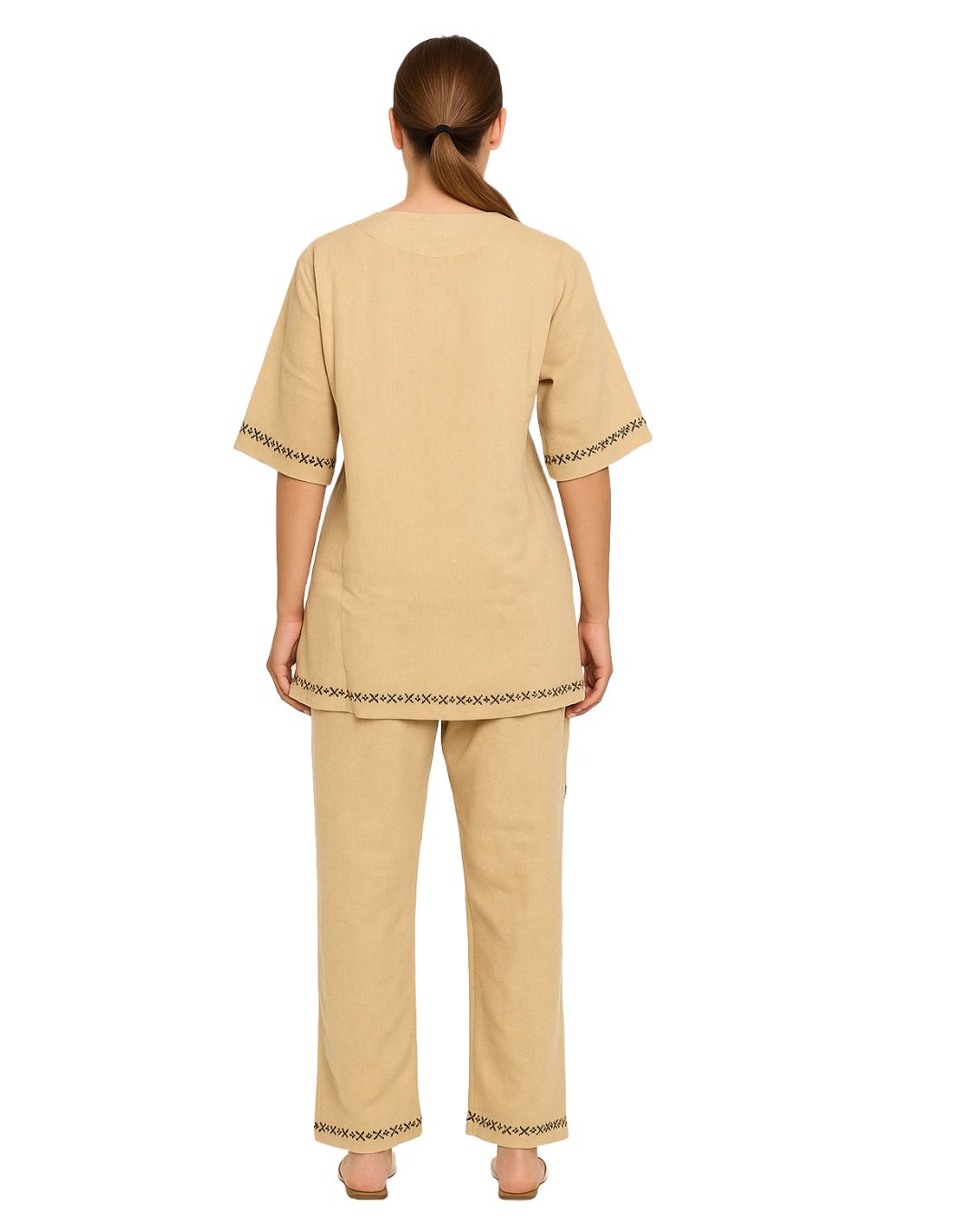 Beige pajama set with lace trim on a white background