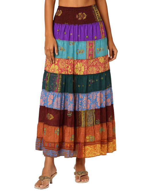 Multicolored patterned skirt worn by a model on a white background